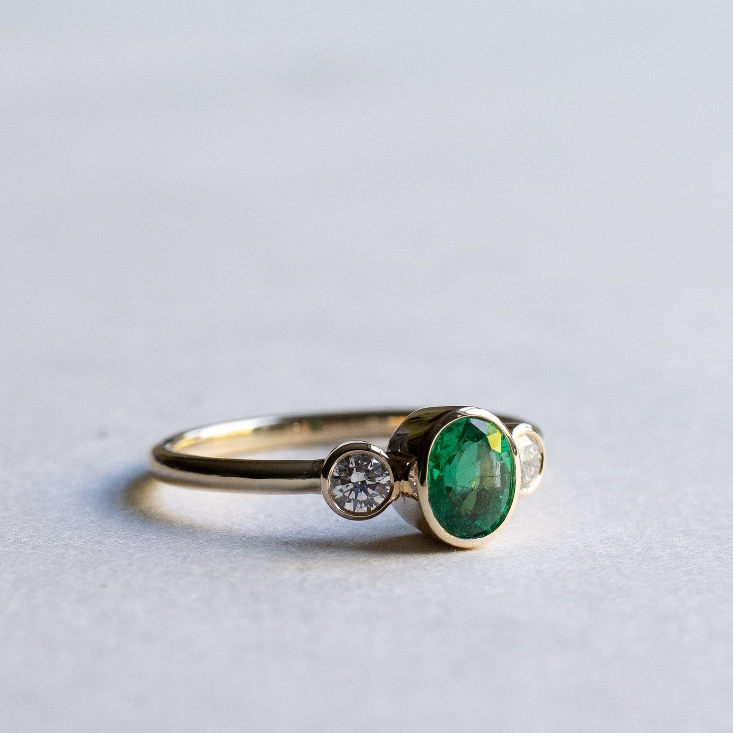 14K Emerald Diamond Three Stone Ring